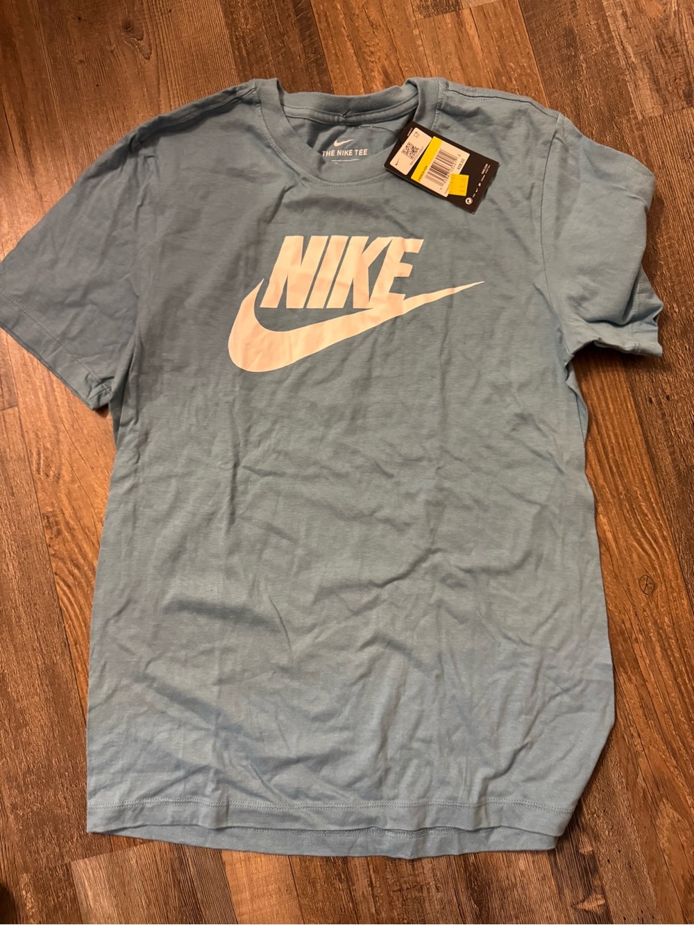 Nike Short-Sleeve Logo Tee in Light Blue with White Swoosh